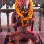 2014.12.10 Kathmandu 105 Durbar sq god with marigolds ResizeBy Donna Yates CC BY-NC-SA